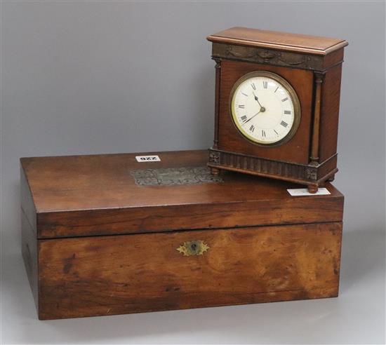 A writing slope and a French mahogany mantel clock